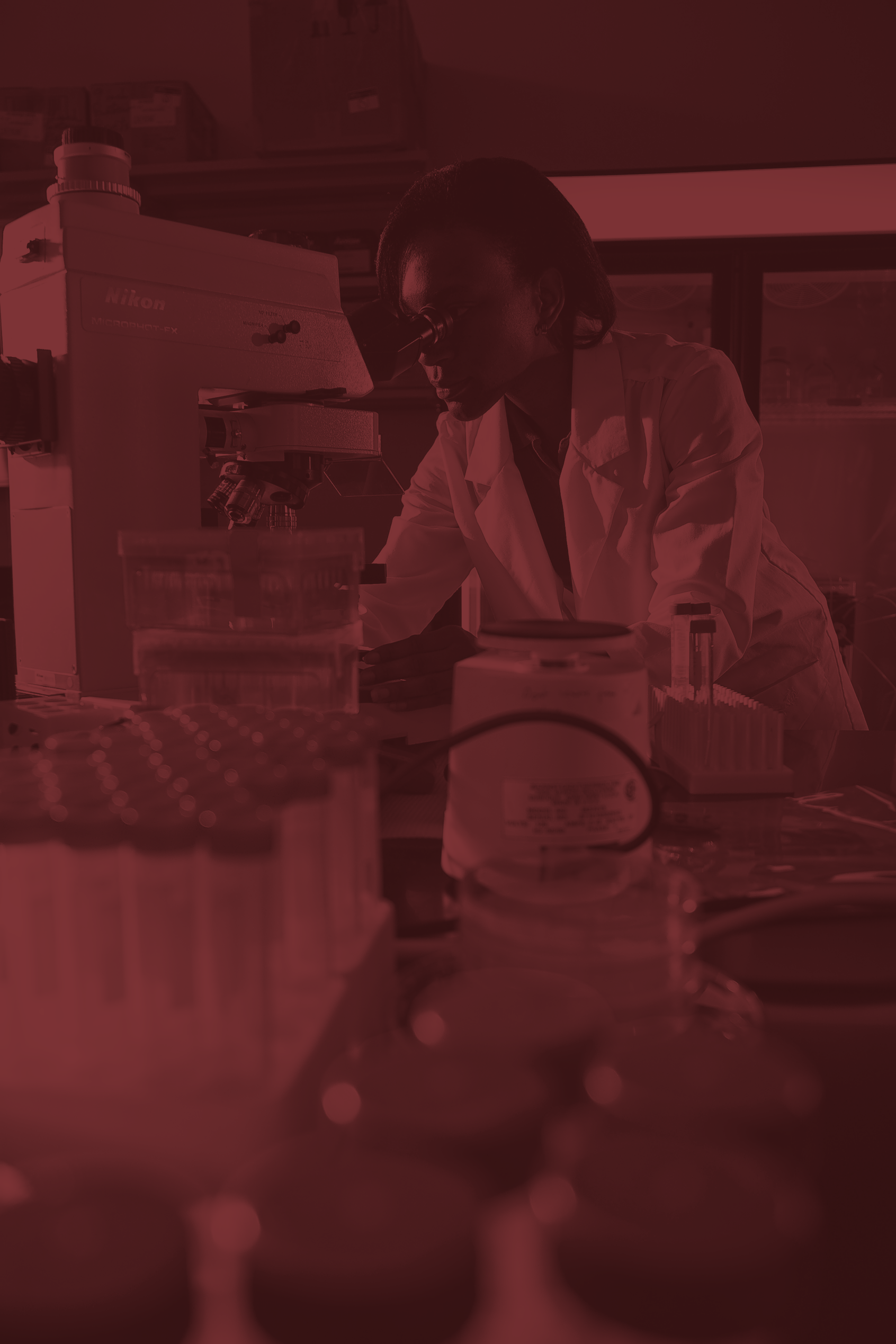 chemist measuring chemicals in lab environment
